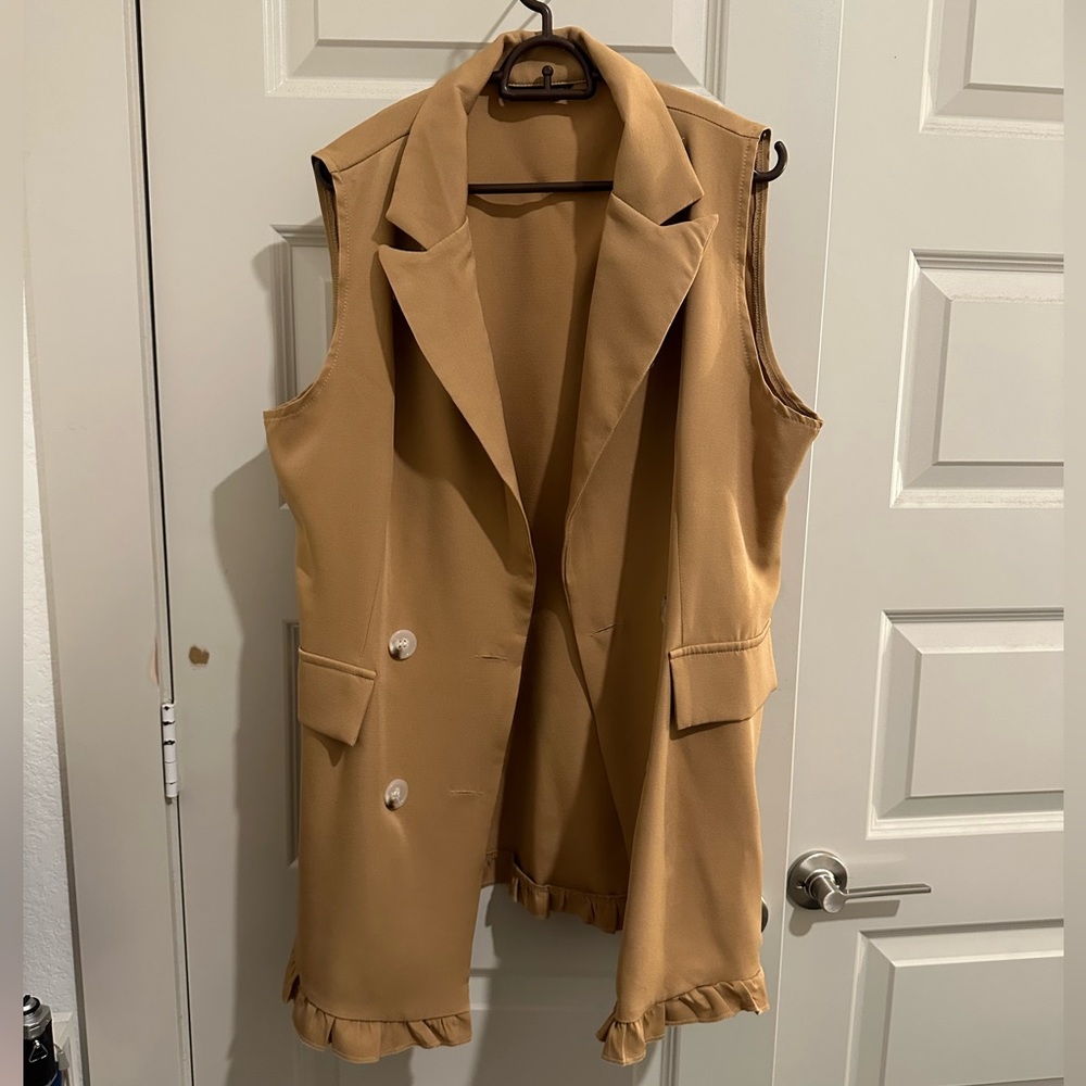 Brown vest, good condition